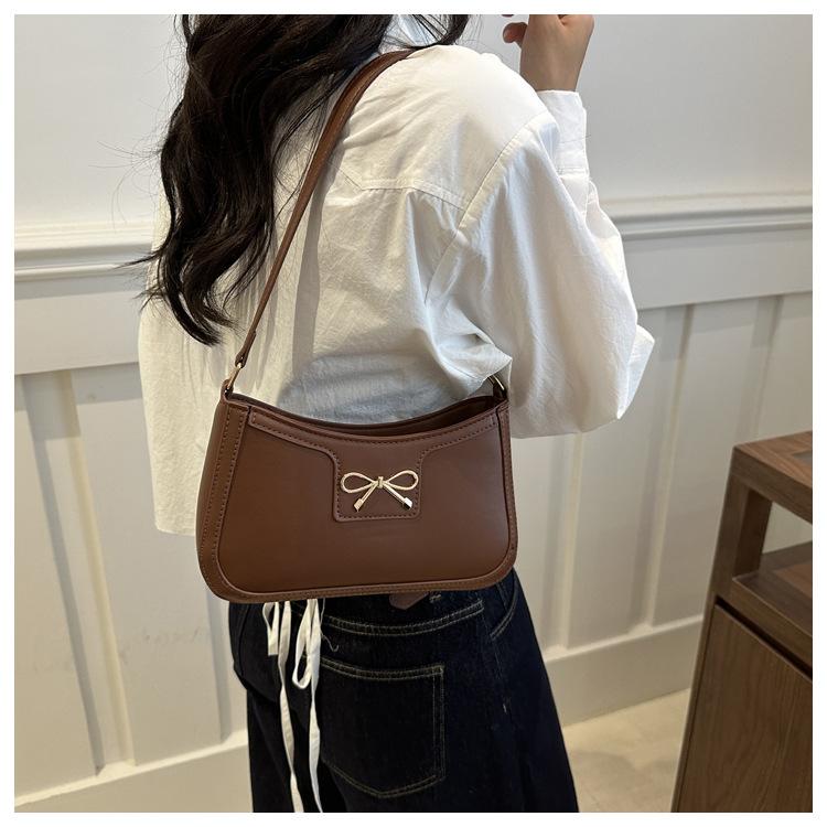Fashion Bow Knot Faux Leather Armpit Bag Elegant Metal Decorated Shoulder Handbag for Women