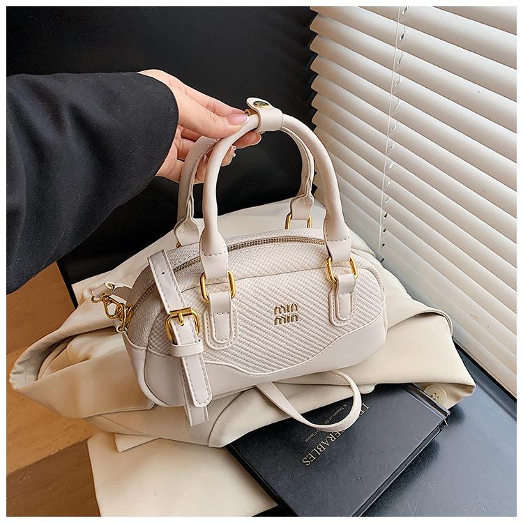 Kuddeväska vår ny mångsidig dam liten väska nischdesign axelväska avslappnad sned väska