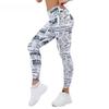 Gradiente a quattro aghi a sei righe con stampa digitale per giornali Yoga attillati a nove pantaloni da donna