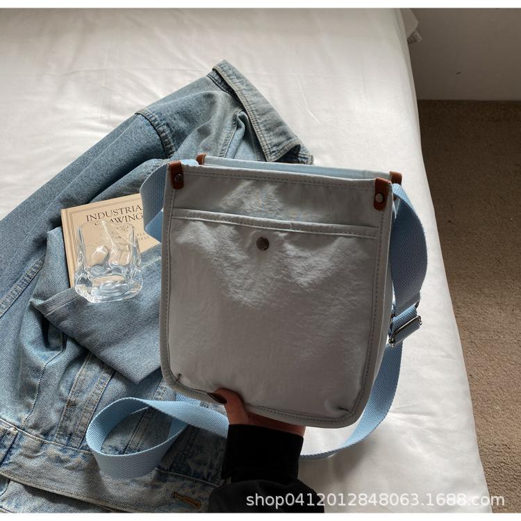 Korean version of casual canvas bag new solid color simple fashion trend shoulder bag niche design messenger bag mobile phone bag