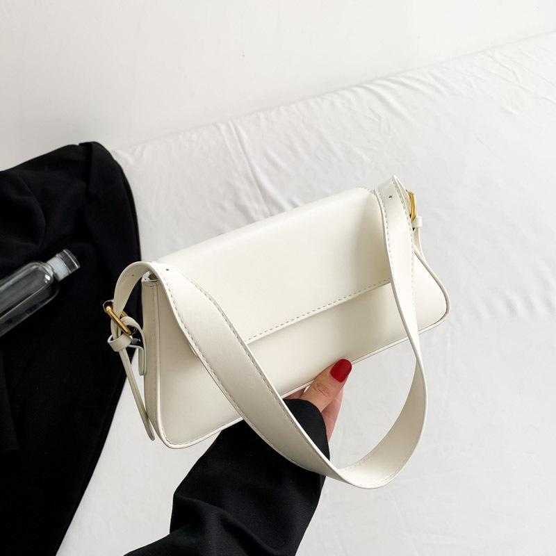 Today's popular new trendy fashion baguette small square bag niche design solid color single shoulder underarm commuter women's bag