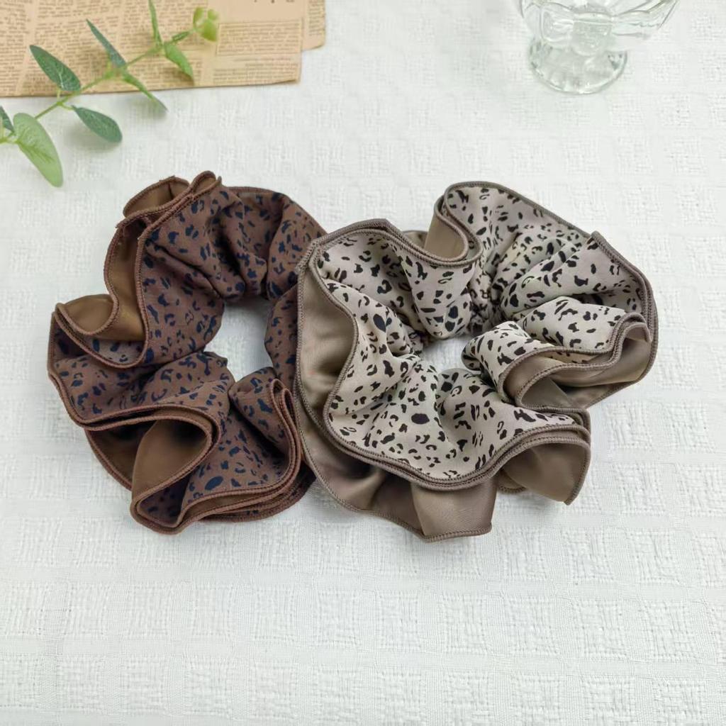 Meillard Leopardenmuster Dunkel Vierlagiges Haargummi Dutt Blume – Vielseitige Herbst/Winter Kopfbedeckung