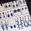 Exquisite Blue Flower Zirconia Stud Earrings: Silver Needle French Court Style