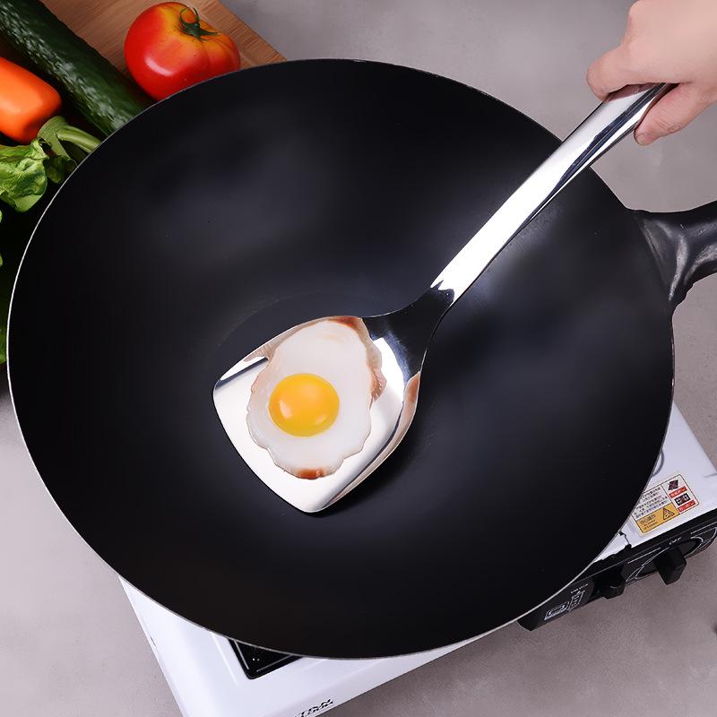 Household old-fashioned iron pan, black steel wok, single-handled non-stick pan, chef's stir-fry pan with round bottom.