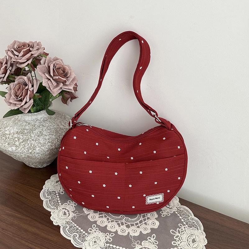 

Korean-style niche polka dot canvas bag2026New large-capacity shoulder bag with a high-end feel, suitable for commuting, crossbo червоний