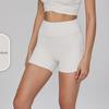 Bare-Feel High-Waisted Yoga Shorts: Butt-Lifting, Peach Drawstring, Three-Quarter Fitness Pants for Women.