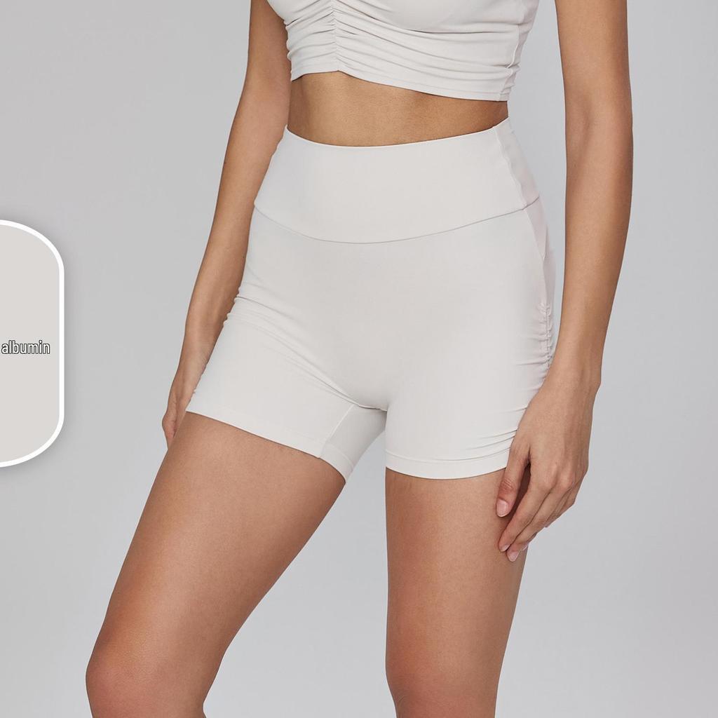 Bare-Feel High-Waisted Yoga Shorts: Butt-Lifting, Peach Drawstring, Three-Quarter Fitness Pants for Women.