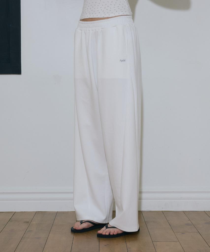 Apeijeu Semi-Curved Cut-Detail Logo Pants(White)