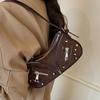 European and American Fashion Personalized Rivet Underarm Bag Women's 2025 New Retro Niche Simple Baguette Bag Versatile Messenger Bag