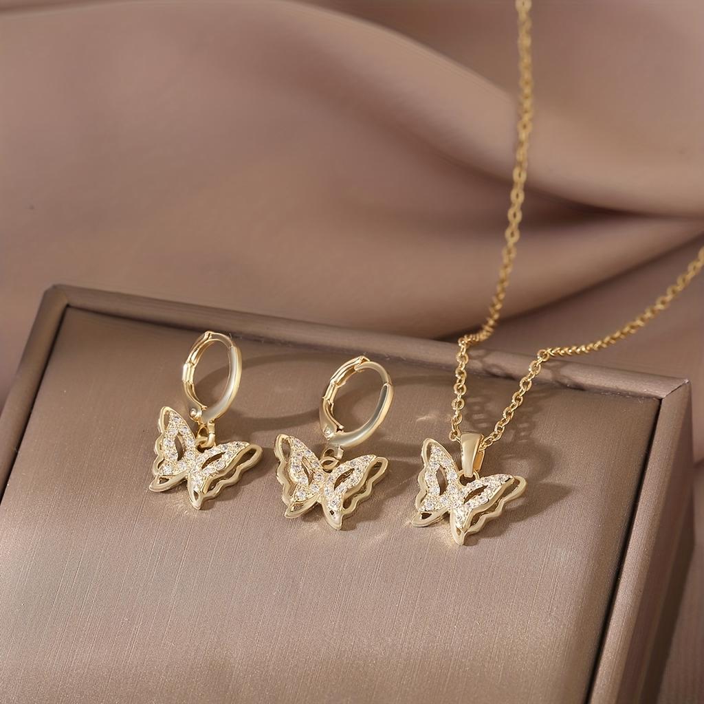 Three-piece set of copper inlaid synthetic zirconia elegant fairy-like butterfly wing pendant earrings and necklace, sparkling luxurious wedding