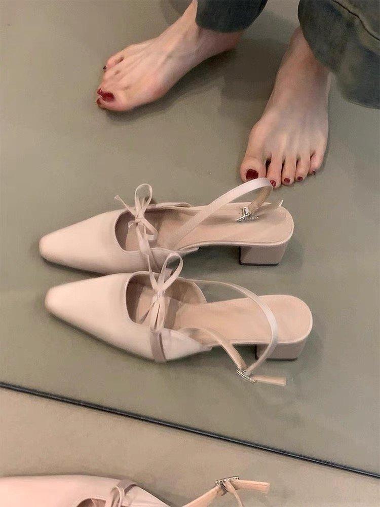 

Soft leather version! Temperament satin bow bag head sandals women s pointed head thick heel one-word strap high heels empty single shoes 40