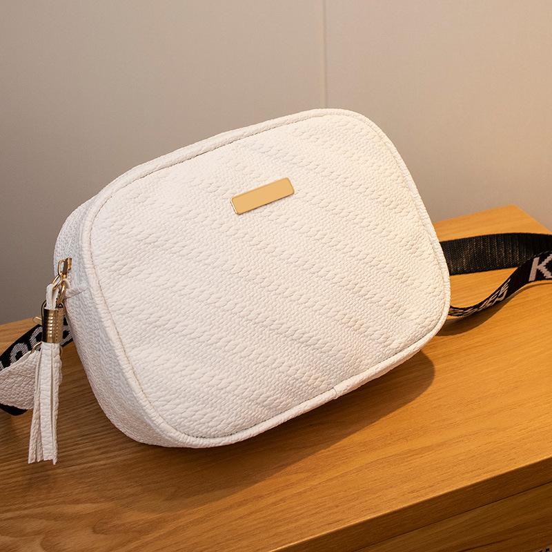 New embossed iron sheet ribbon messenger small square bag casual simple cosmetic bag mobile phone bag