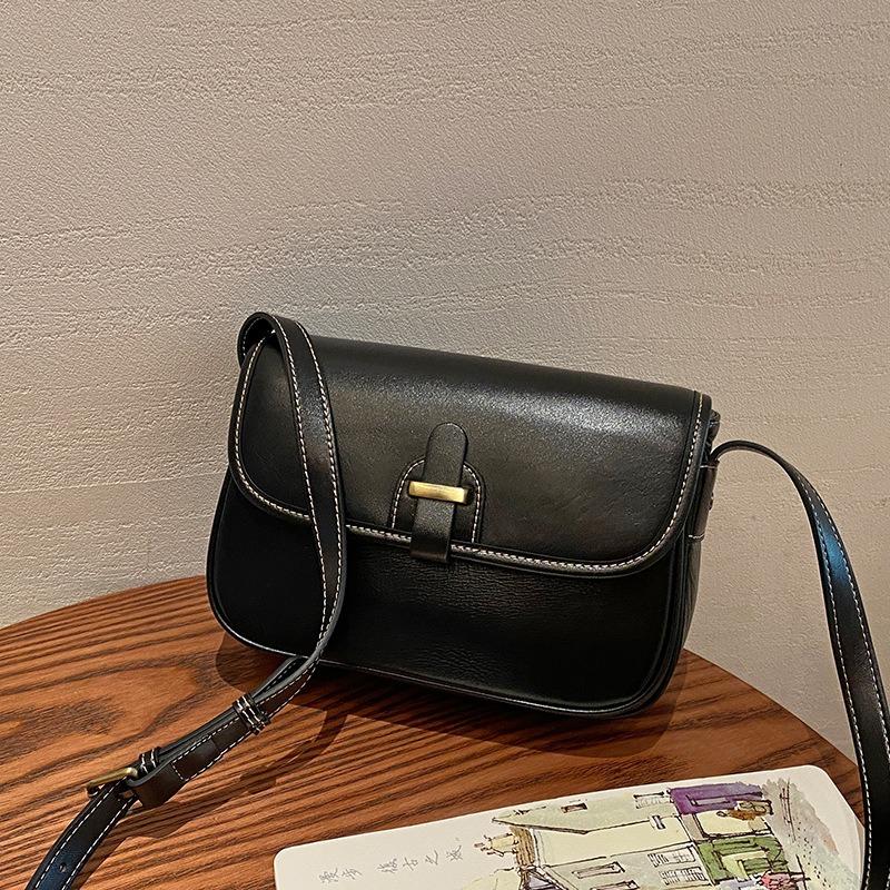 

Leather women s bags, messenger bags, women s new cowhide small square bags, high-end texture and large-capacity commuter shoulder bags.