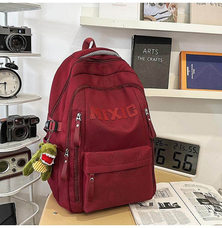 Schoolbag trendy school bag male high school student female graffiti junior high school student backpack college student large capacity lightweight
