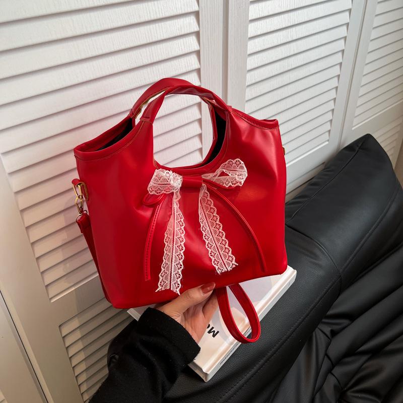 

Винтажная сумка большой вместимости высокой ценности женская 2025 новая универсальная на плечо подмышку портативная сумка-ведро с бантом красный