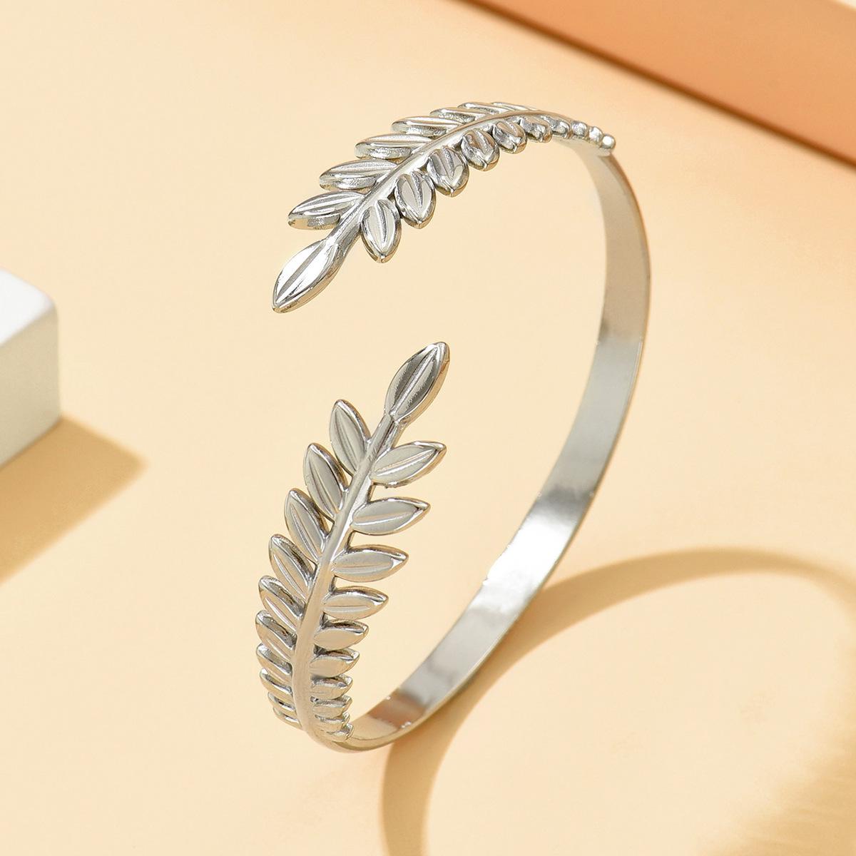 Titanium Steel Leaf Bracelet: Elegant Adjustable C-shaped Wheat Ear Design Accessory.