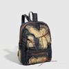Retro-Rucksack aus wassergewaschenem Denim mit einem Nischendesign, mit einer Schleife und einem großen Fassungsvermögen für den Arbeitsweg.