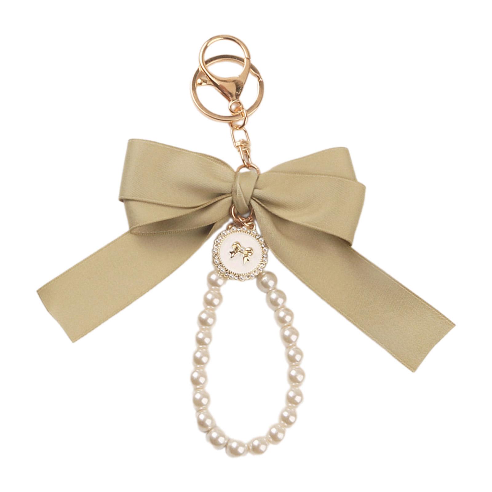 Элегантный брелок с жемчужной цепочкой и большой лентой с подвеской в ​​виде банта — фото 10