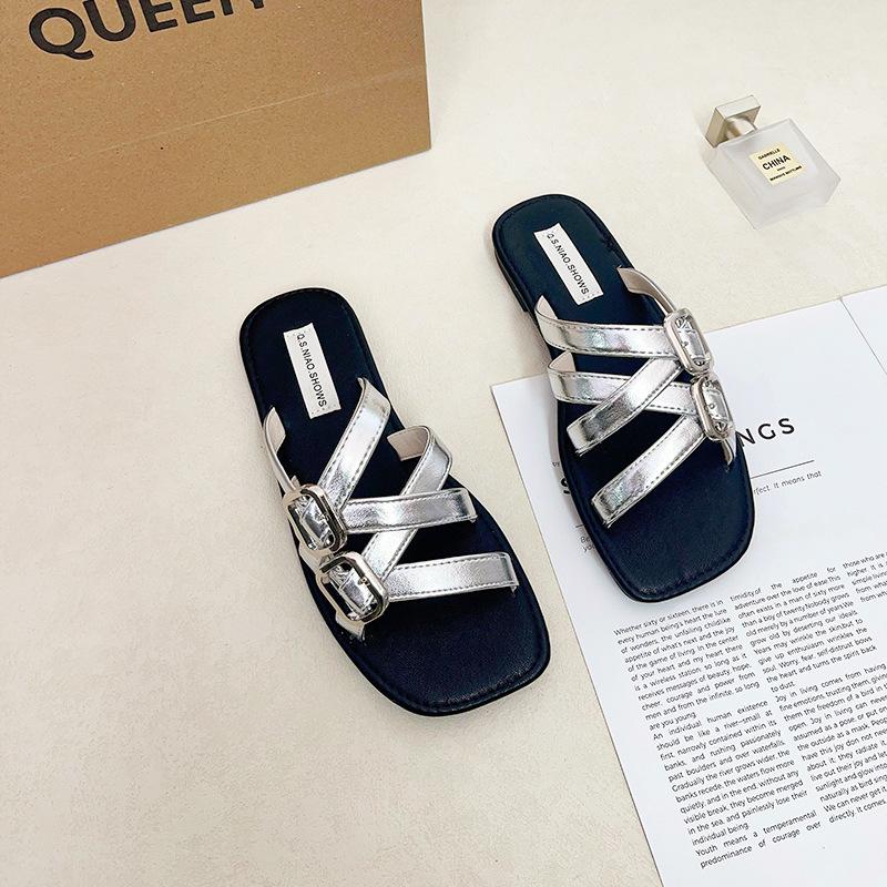 

French flat bottom cross with open toe cool slippers female 2025 summer new wear fairy wind beach slippers 40 серебряный