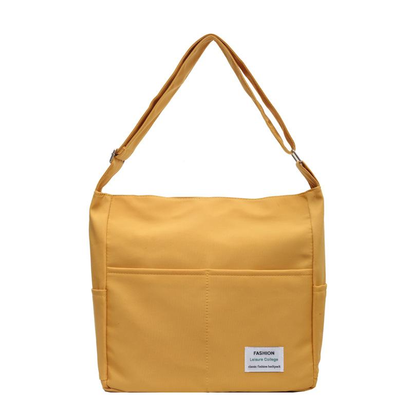 

Жіноча сумка-месенджер Нейлонова сумка через плече Студентська сумка для репетитора Сумка великої місткості жовтий