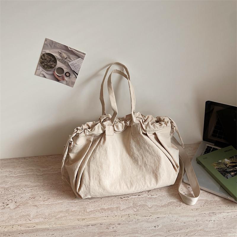 Einfarbige Kordelzug-Handtasche Damen-Schultertasche Große Kapazität Pendler-Crossbody-Tasche