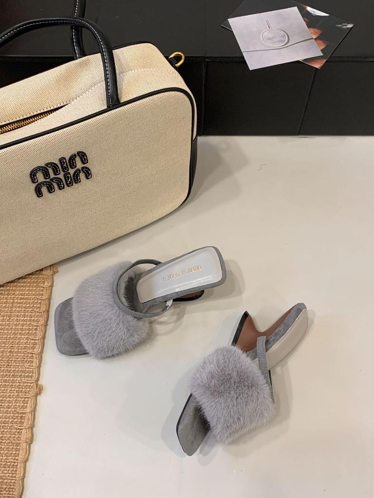 In the autumn and winter of 2025, the new European and American wedges with French square head open-toed fluffy slippers are worn outside women's sh