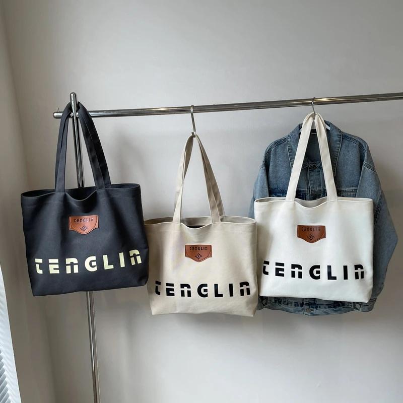 Women's shoulder bag printed letter large capacity monochromatic stitching line casual bag