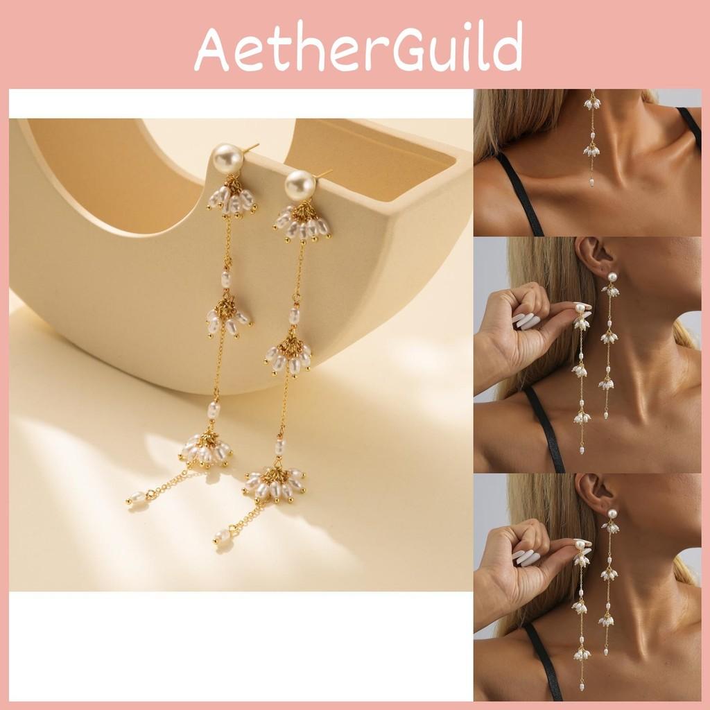 Gold Plated Modern Geometric Earrings With Tassel And Chain Details