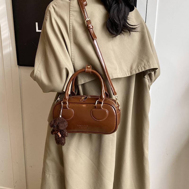 Tragbare Bowlingtasche Damen 2025 neue trendige Mode einfache Kissen-Tasche einzelne Schulter Umhängetasche trendy