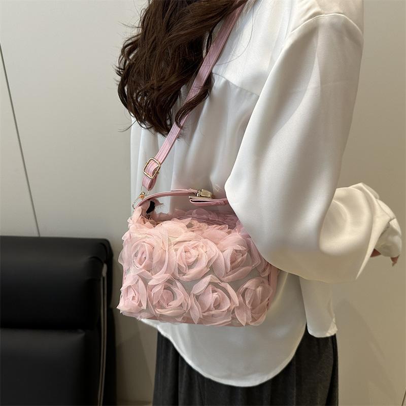 Internet celebrity fashion three-dimensional flower handheld women's bag 2025 new fairy bag cheongsam bag versatile oblique span bag dinner bag