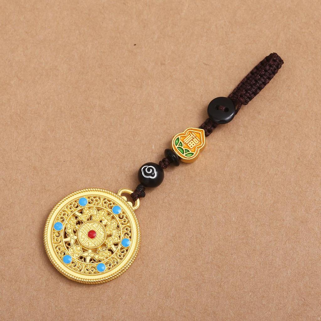 Goldener Glücksschlüsselanhänger: Reichtumsgott verschlingt Goldtier für Familie, perfekt als Auto- oder Handyanhänger.