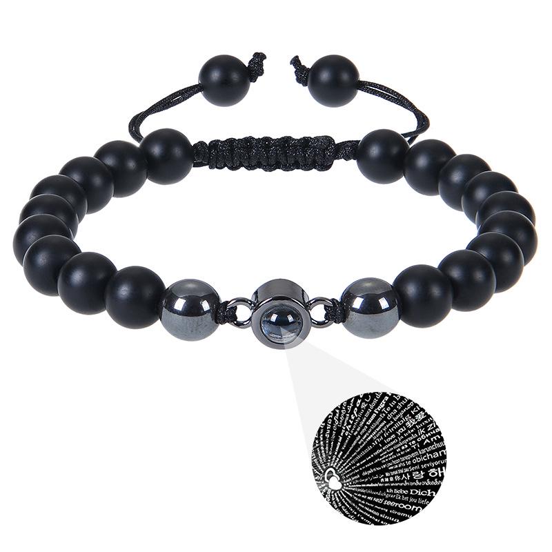 

Multilingual Projection Bracelet with Natural Frosted and Black Magnetic Stone - Couple s Woven Jewelry