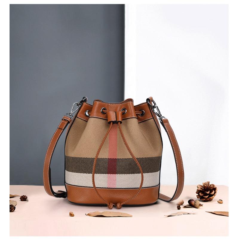New Hand-held Crossbody Canvas Bucket Bag Drawstring Buckle Large Capacity High-end Niche Shoulder Bag for Women