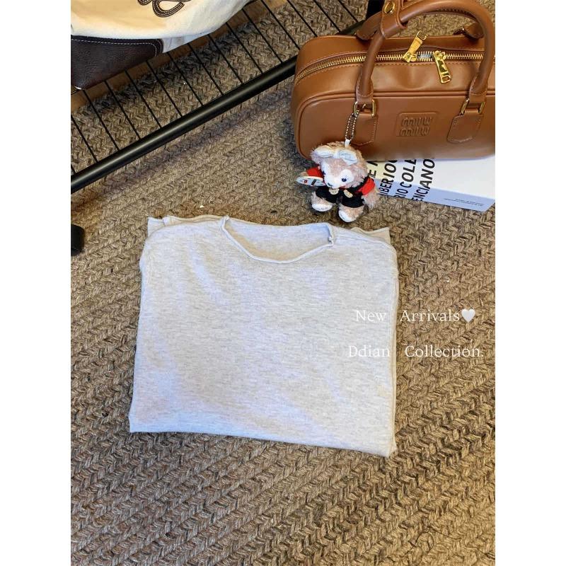 Simple round neck basic knitted bottoming shirt women's autumn and winter casual loose inner top curled sweater