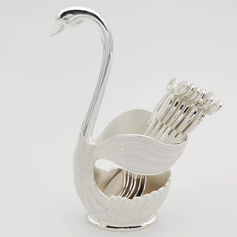 Set Di 7 Cucchiai Da Caffè Dorati Con Supporto A Forma Di Cigno – Posate Eleganti
