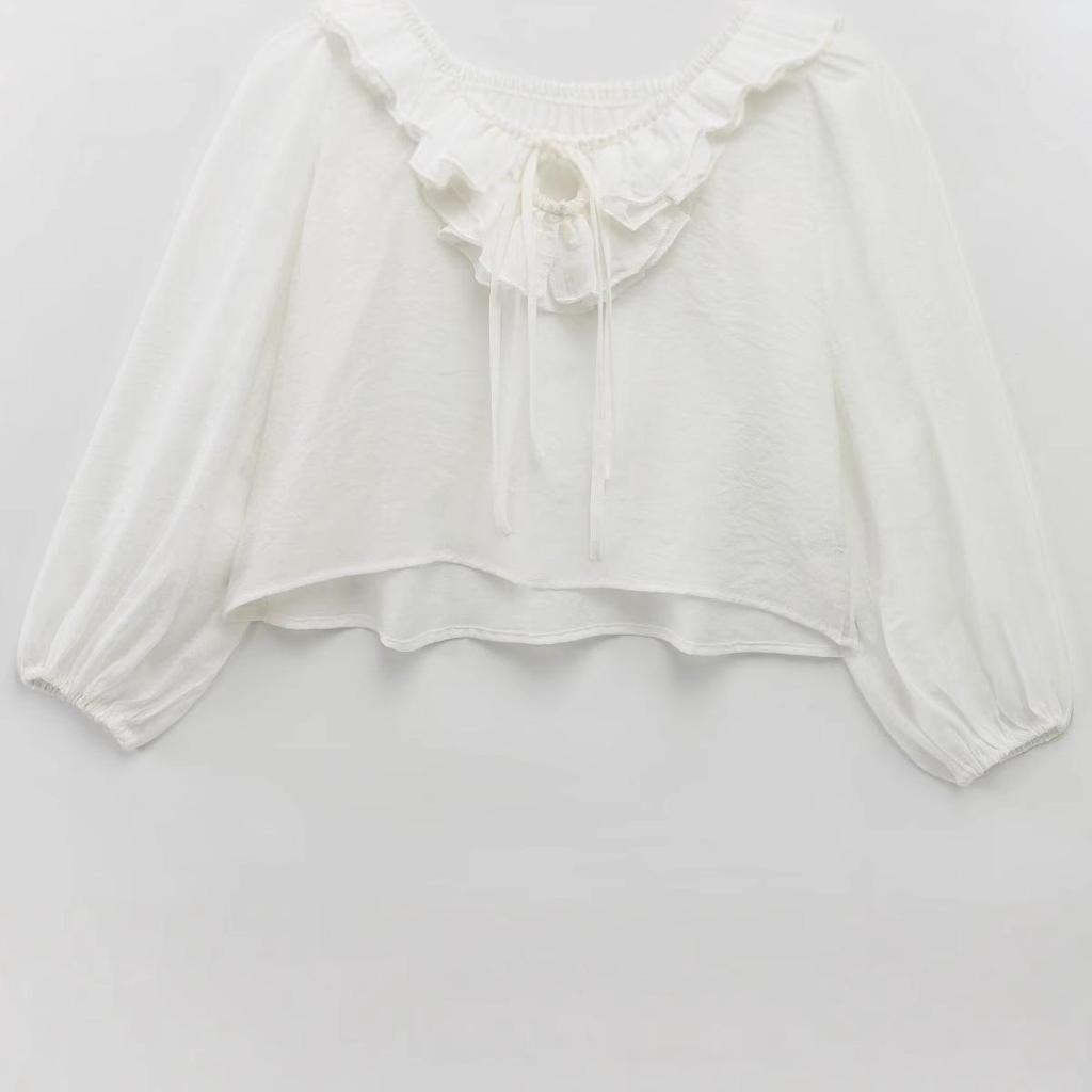 Chemise polyvalente à volants et à nouer style européen et américain pour femmes printemps 2025