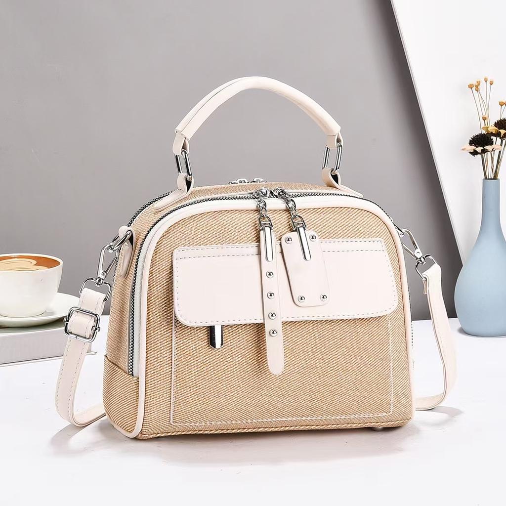 New High Appearance Level Canvas Texture Fashion Trend Handbag Senior Sense Splicing Shoulder Bag Large Capacity Tide