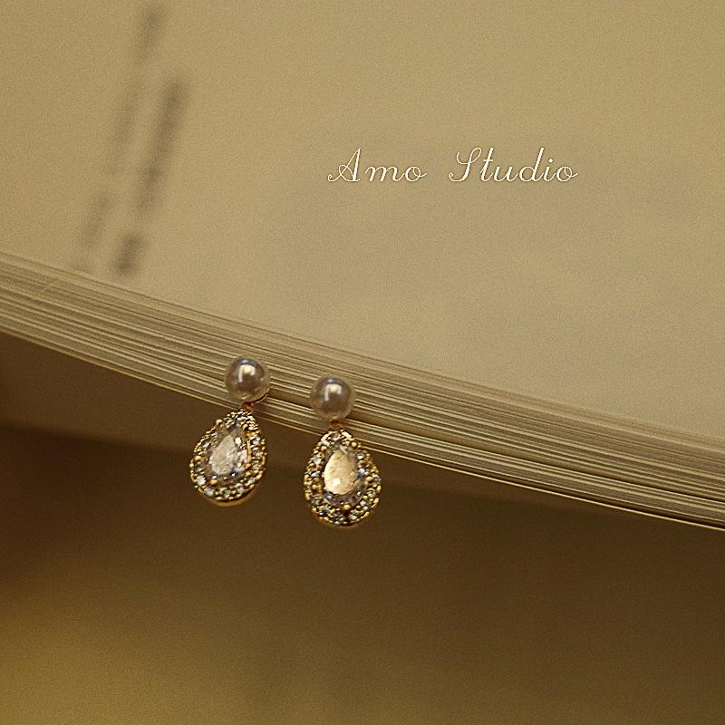 

New trendy Japanese and Korean temperament simple water drop stud earrings female, silver needle niche design earrings Internet celebrity earrings 925 silver needle золотой