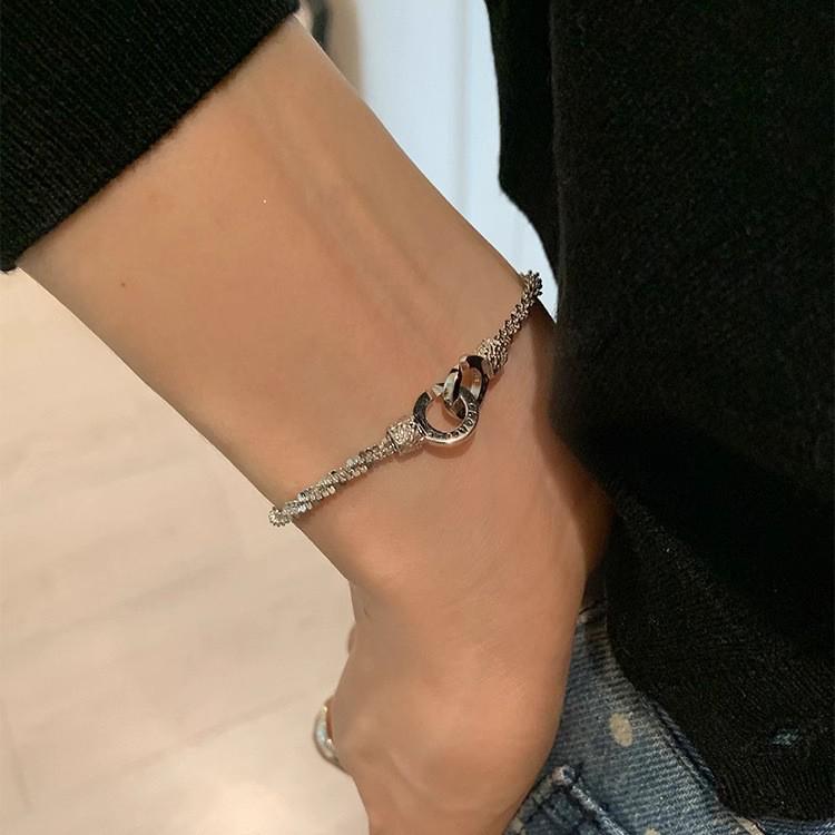 Silver Double Ring Lock Bracelet: Unique, Light Luxury, Fashionable, and Exquisite Design for Women.