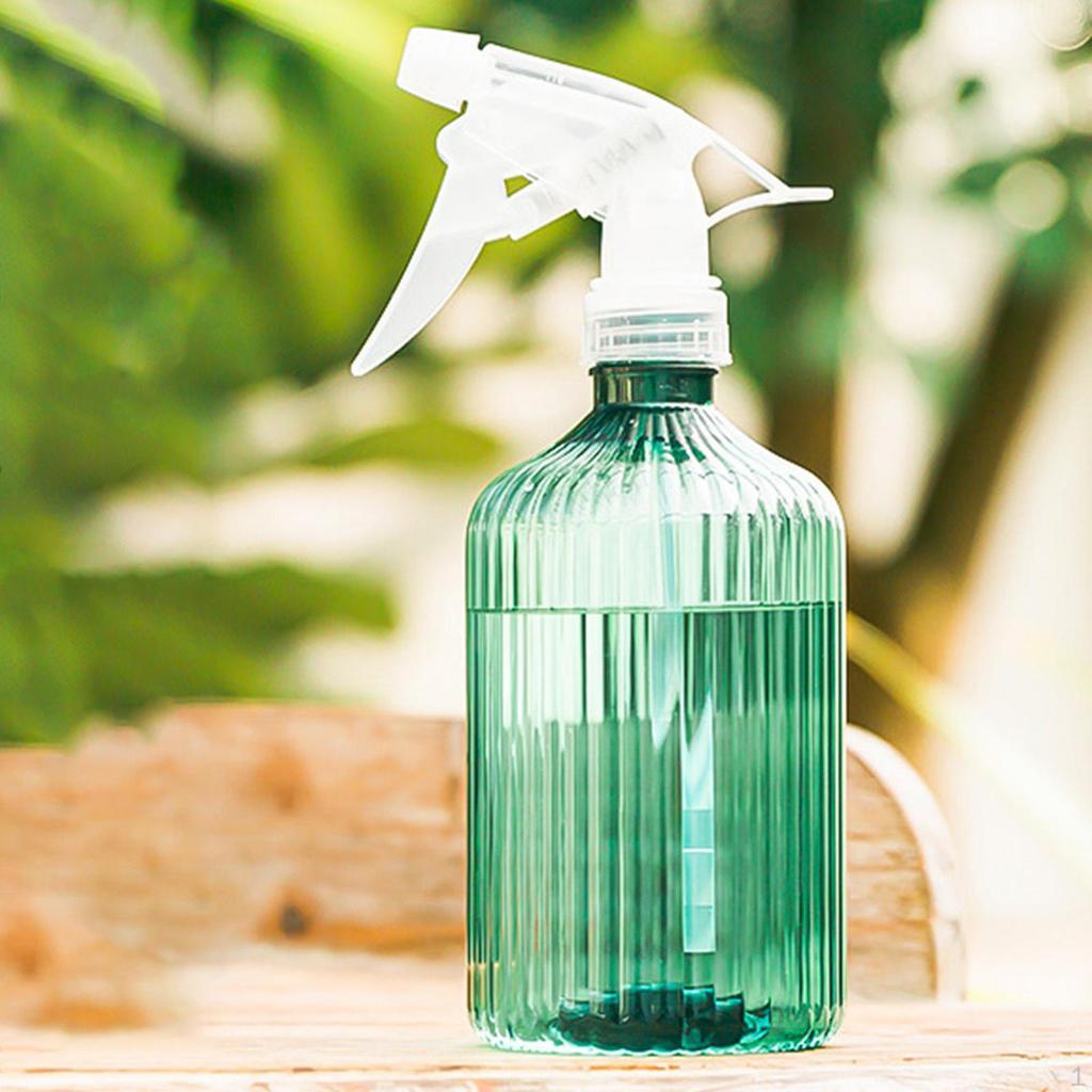 Klare Sprühflasche mit verstellbarem Sprühkopf für den Einsatz zu Hause und im Garten