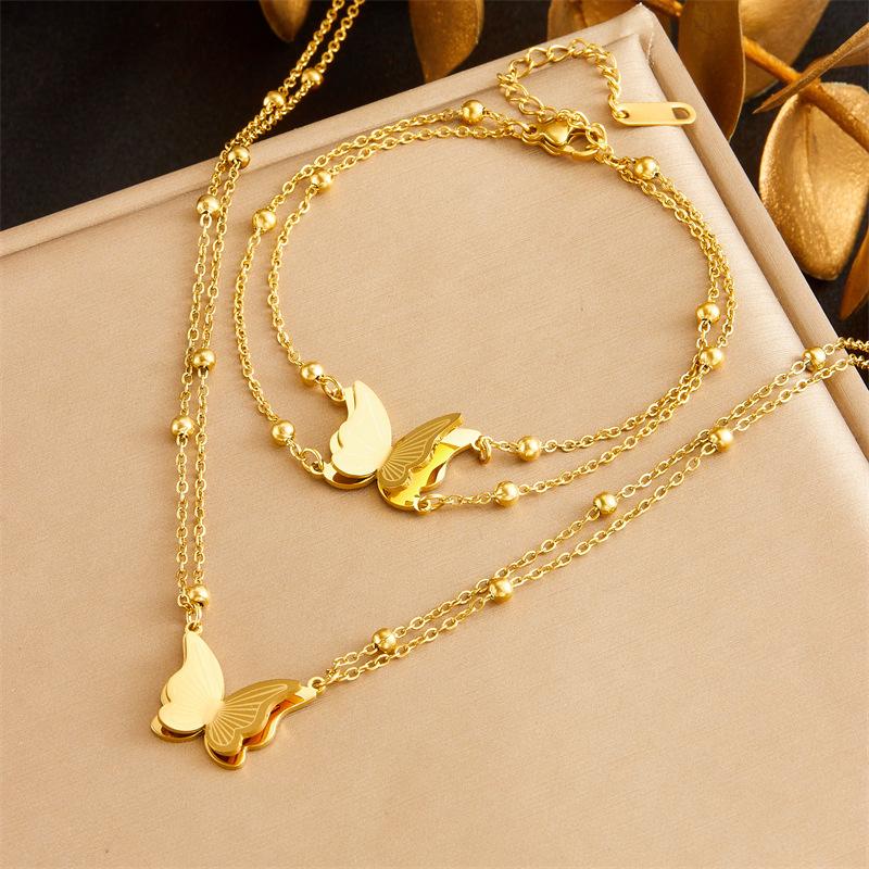 Gold Butterfly Charm Jewelry Set with Beaded Accents золотой