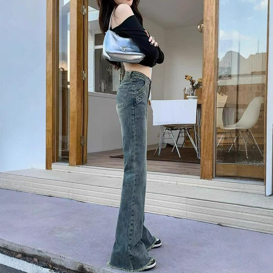 Pear-shaped large-size slightly pulled jeans women's autumn new nostalgic blue fat mm rough-edged high-waisted thin flared pants