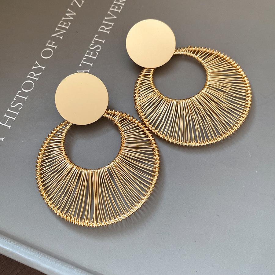 

European and American silver needle round hollow pendant earrings light luxury high-end earrings fashion versatile earrings design sense niche