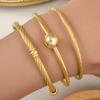 Trend European and American Personality Twist Opening Adjustable Twist Steel Wire Gold Ball Bracelet 2026