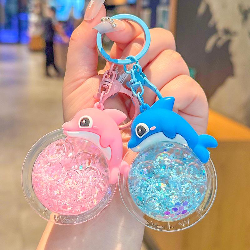 2025 New Oil Flowing Sand Dolphin Keychain: Cute Marine Animal Backpack Pendant for Girls