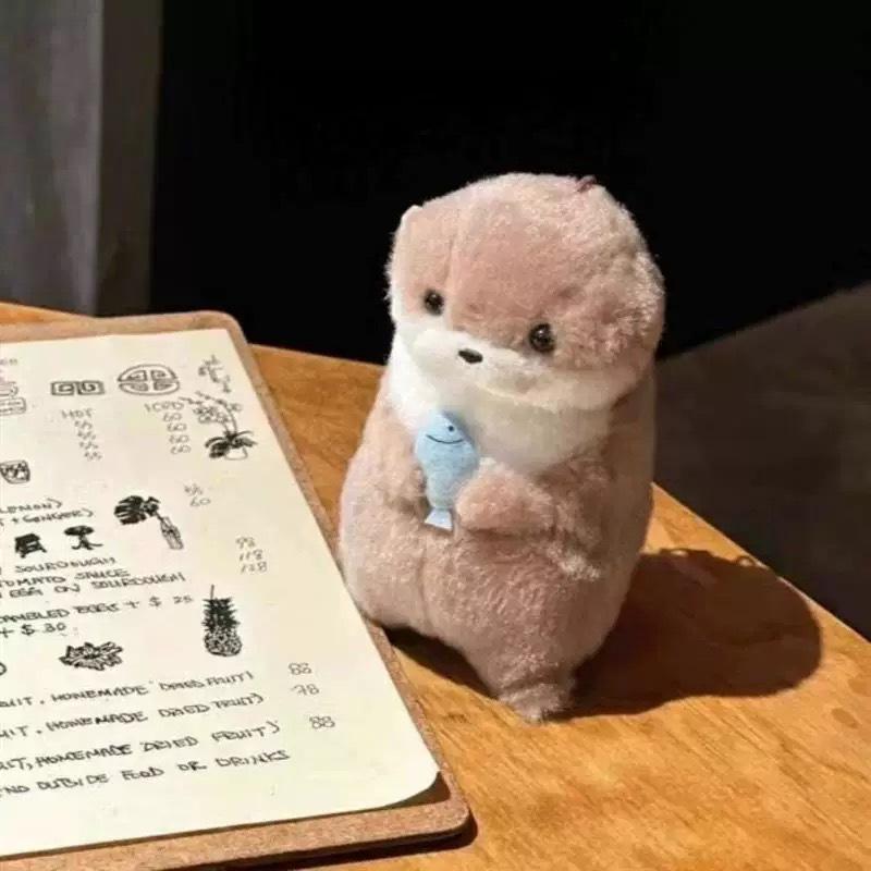 

Cute Otter Holding Fish Plush Pendant - Creative Gift Idea