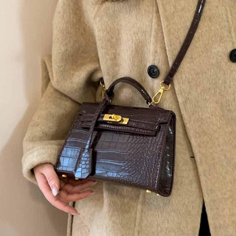 Hand-held small bag women's versatile 2025 new autumn and winter fashion texture cross-body small bag high-end shoulder bag
