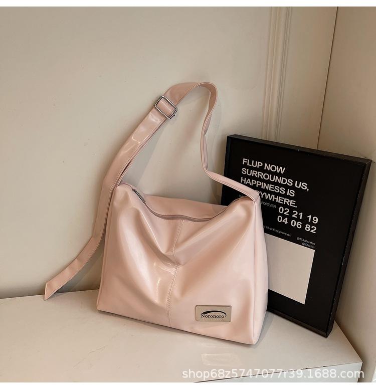 

Retro large-capacity women s bag 2025 new commuter grocery bag fashionable casual shoulder crossbody tote bag рожевий
