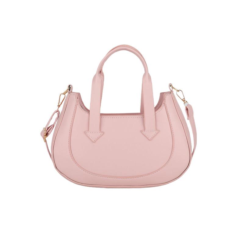 

French niche underarm bag women s 2024 new texture versatile crescent bag fashionable foreign shoulder messenger bag рожевий