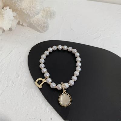 Armbänder Sternarmband Damen vergoldet schlichtes Retro-Temperament Highlight Perle Mesh Rot Handschmuck